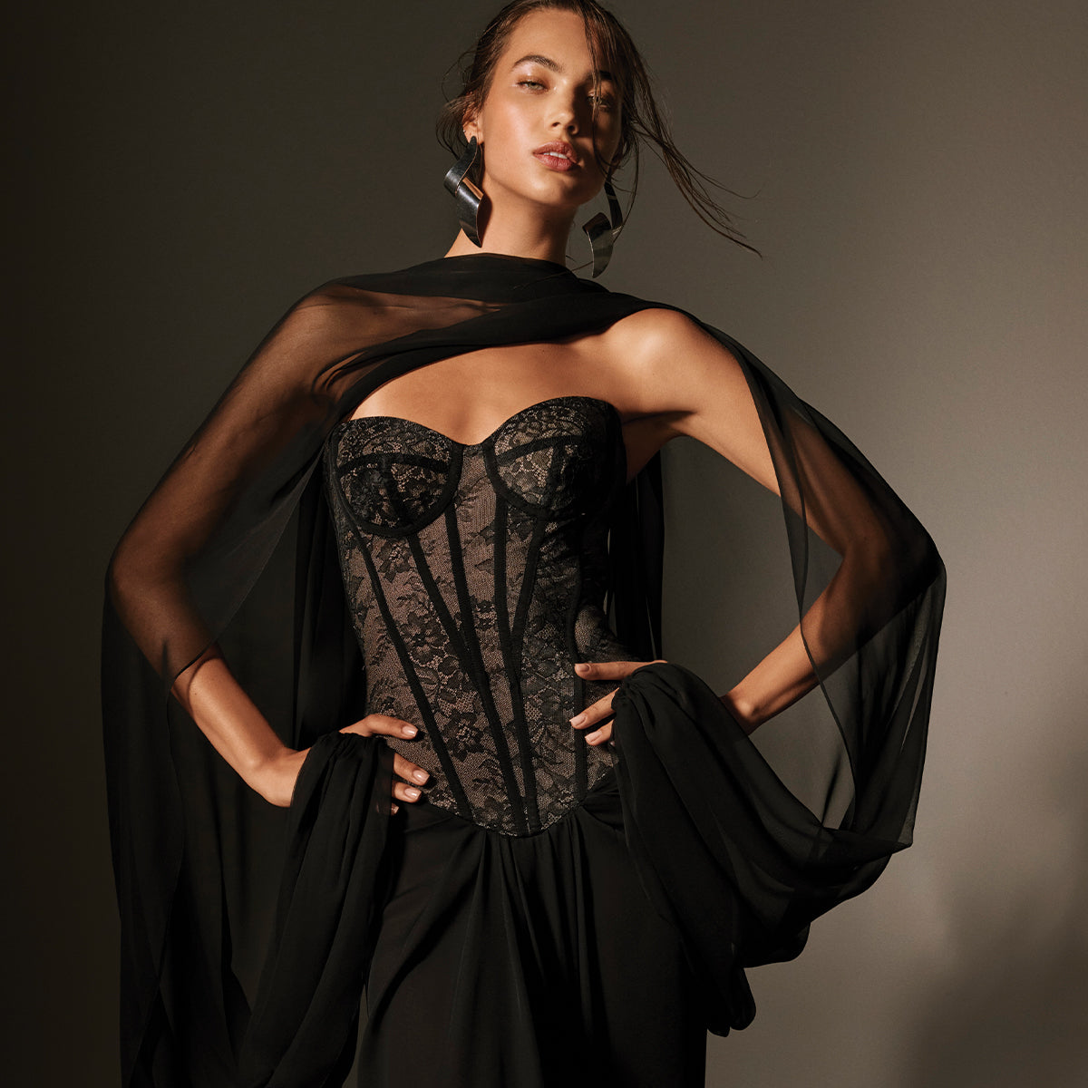 Monique Lhuillier Spring 2026 Strapless corseted bodice gown with chiffon shawl in Noir chantilly lace and georgette-lookbook