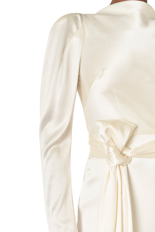 Monique Lhuillier Fall 2024 Long sleeve silk white satin gown with Bateau neckline, V-back and detached self-tie sash - fabric.