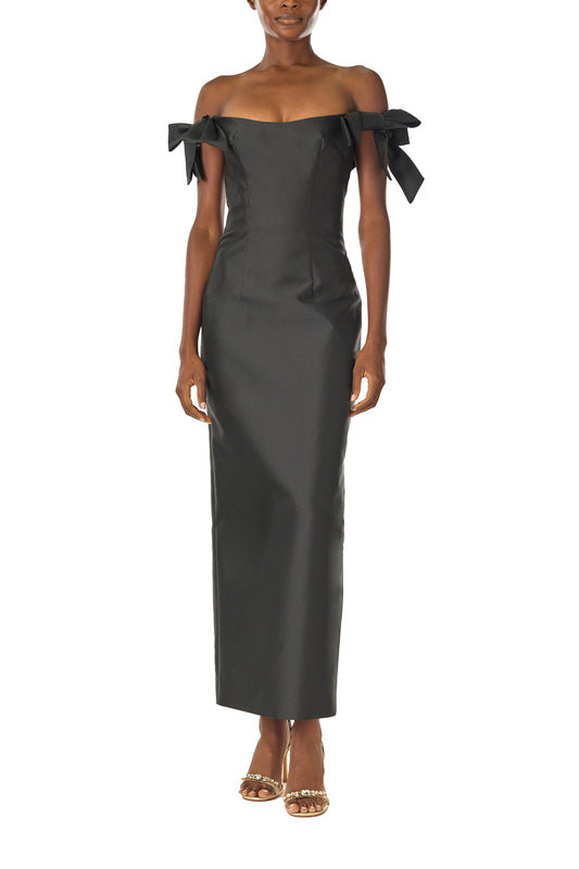 Monique Lhuillier Fall 2024 off the shoulder sheath dress with bow sleeves in Noir mikado - front.
