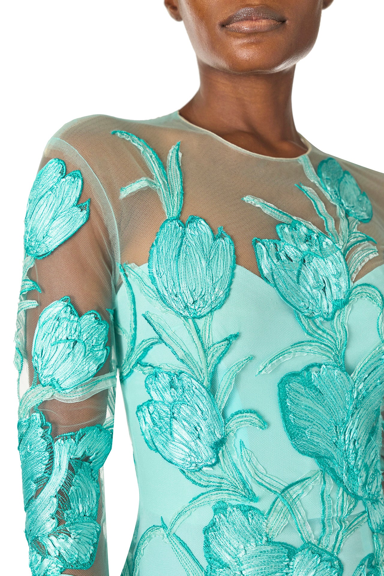 Monique Lhuillier Spring 2025 Embroidered, aqua floral tulle long sleeve trumpet gown with jewel neckline - fabric detail.