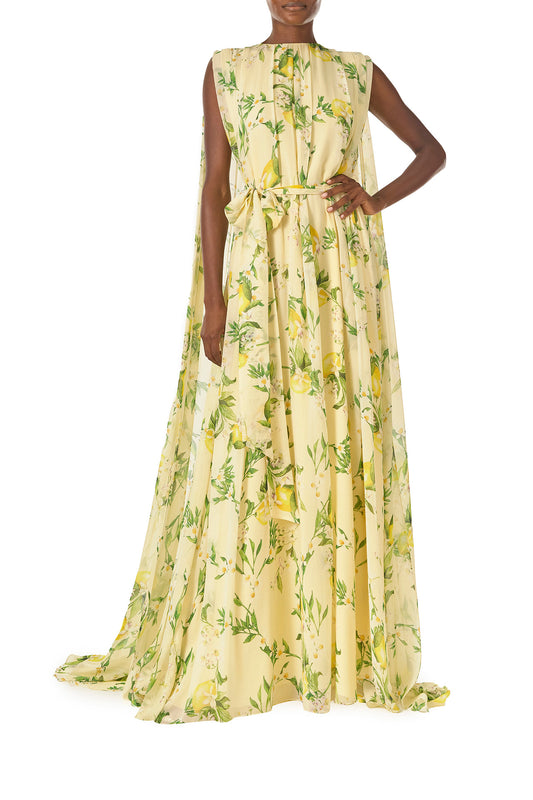 Monique Lhuillier Spring 2025 Lemon printed georgette sleeveless draped gown with integral cape - front.