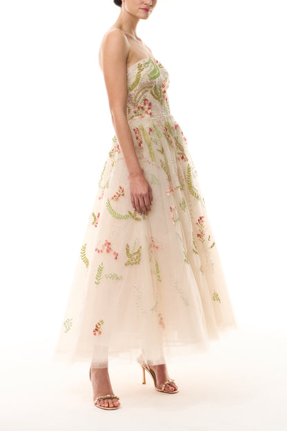 Monique Lhuillier Spring 2025 strapless dress with tea length skirt in Prosecco Multi colored embroidered tulle - side.