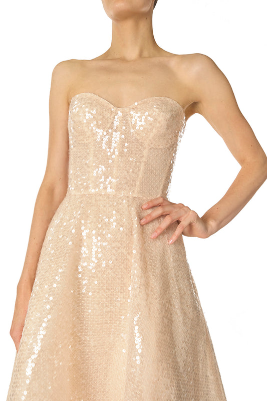 Monique Lhuillier Spring 2025 strapless, tea-length dress with sweetheart neckline in prosecco colored sequins - fabric.