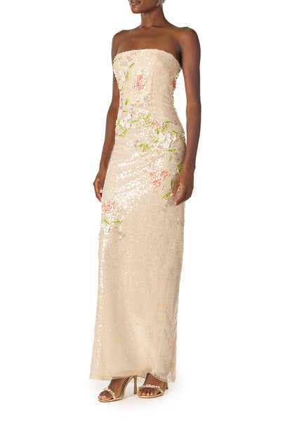 Monique Lhuillier Spring 2025 Strapless, column gown in all-over prosecco colored, floral embroidered sequins - left side.