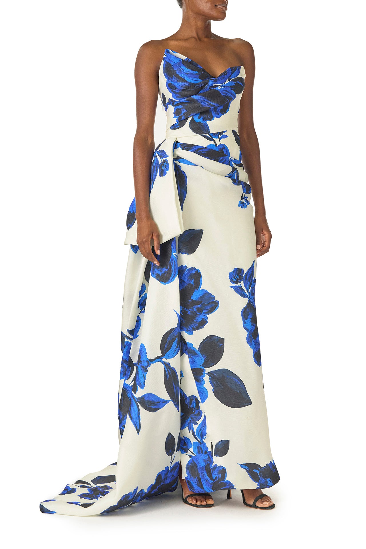 Monique Lhuillier Spring 2025 Strapless, column gown with asymmetric neckline, tufted draping and sweeping side train in Nautical Blue Floral printed gazar - right side.