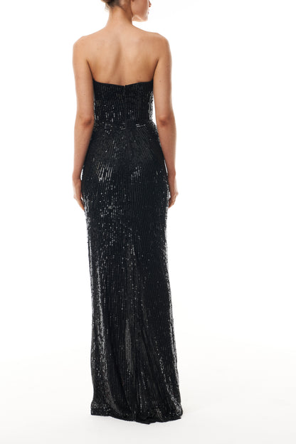 Monique Lhuillier Fall 2025 Noir embroidered tulle Strapless draped column gown with high slit - back.