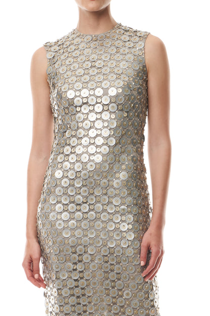 Monique Lhuillier Fall 2025 Sleeveless, tea-length shift dress in silver & gold disc embroidery - fabric.