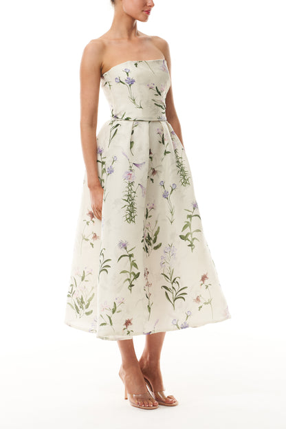 Monique Lhuillier Fall 2025 strapless dress with pleated waistline in floral printed gazar fabric - side.