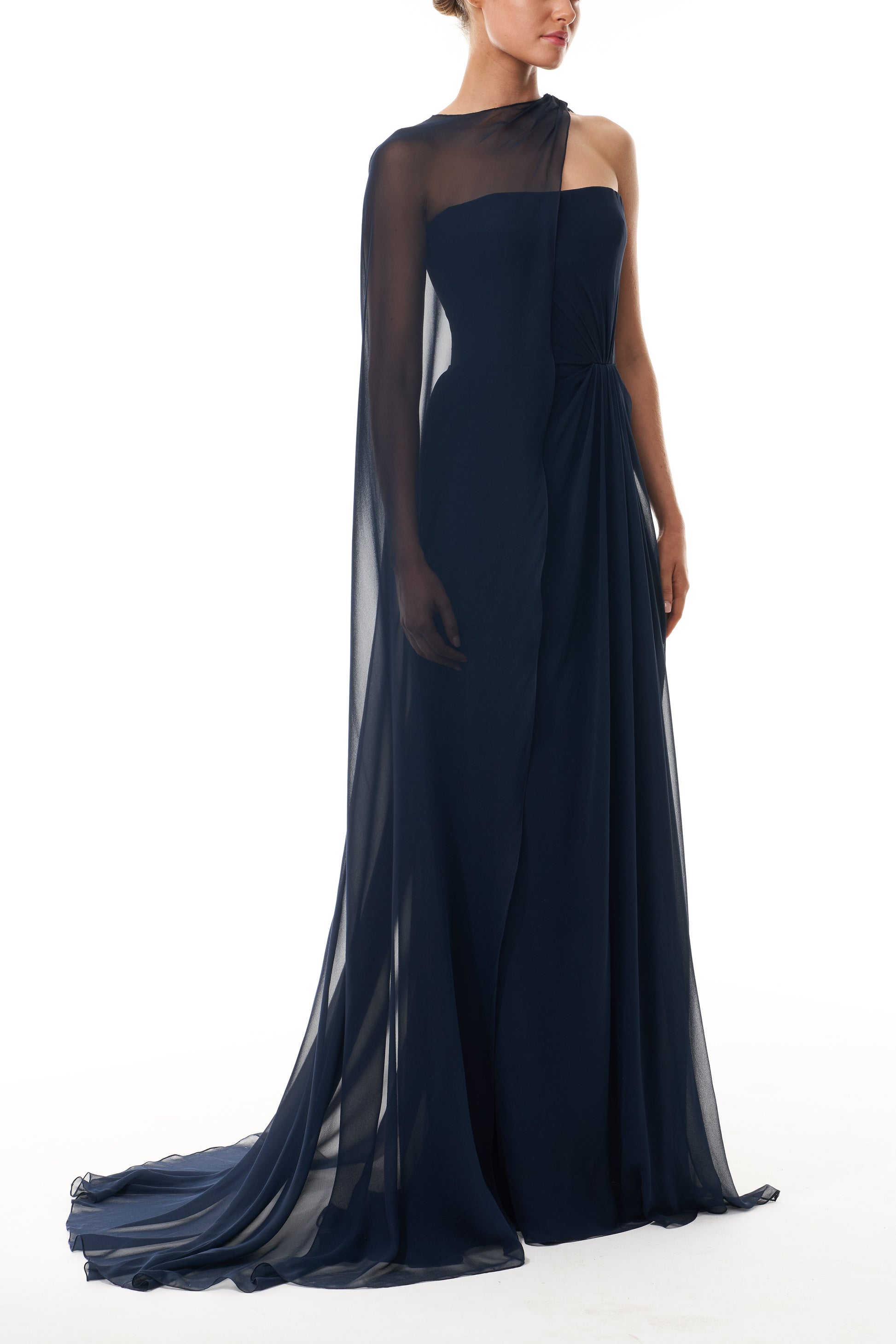 Monique Lhuillier Fall 2025 strapless draped gown with floor-length cape in Ocean chiffon - side. 