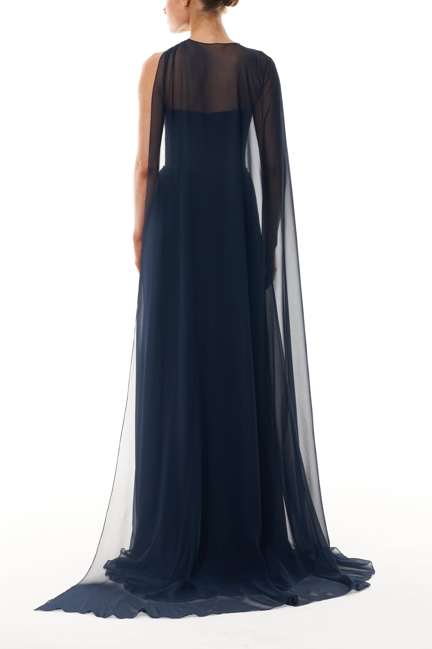 Monique Lhuillier Fall 2025 strapless draped gown with floor-length cape in Ocean chiffon - back. 