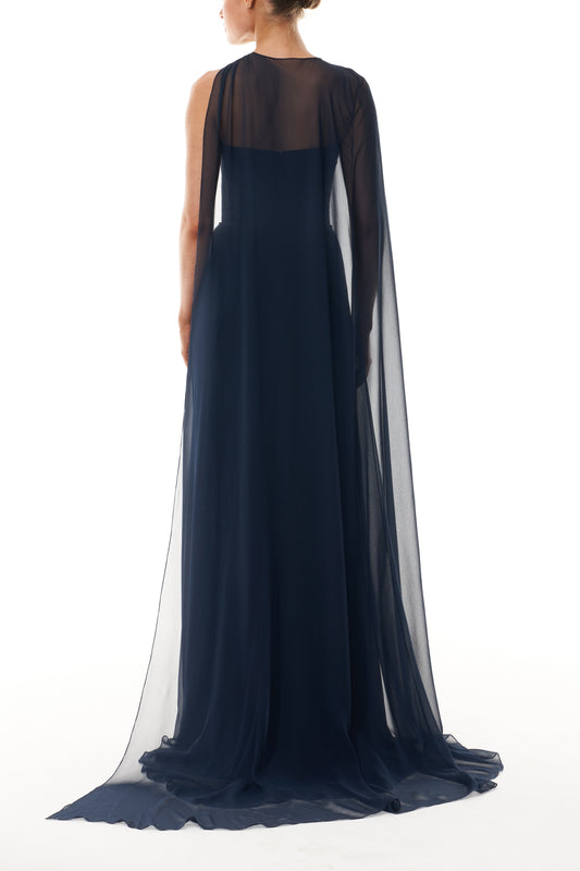 Monique Lhuillier Fall 2025 strapless draped gown with floor-length cape in Ocean chiffon - back. 