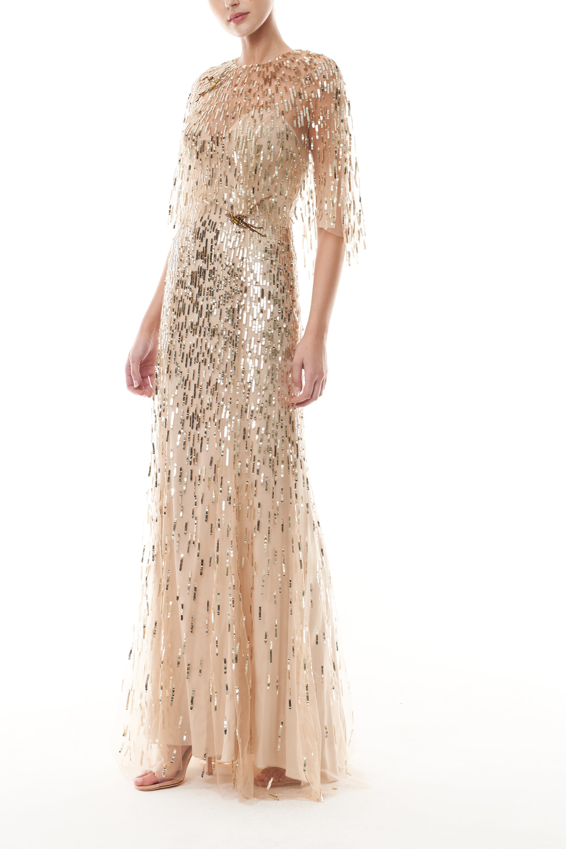 Monique Lhuillier Fall 2025 gold sequin embroidered tulle gown with integral capelet - side.