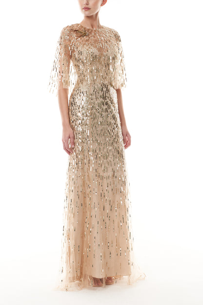 Monique Lhuillier Fall 2025 gold sequin embroidered tulle gown with integral capelet - side.