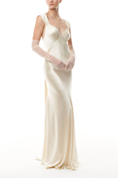 Opera length gloves in blush tulle.  Shown with an ivory satin gown.