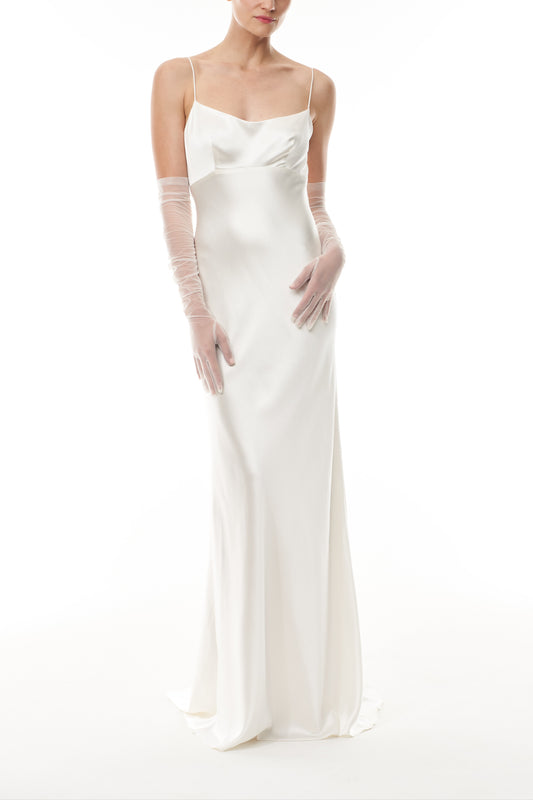 Opera length gloves in silk white tulle shown with a satin slip gown.