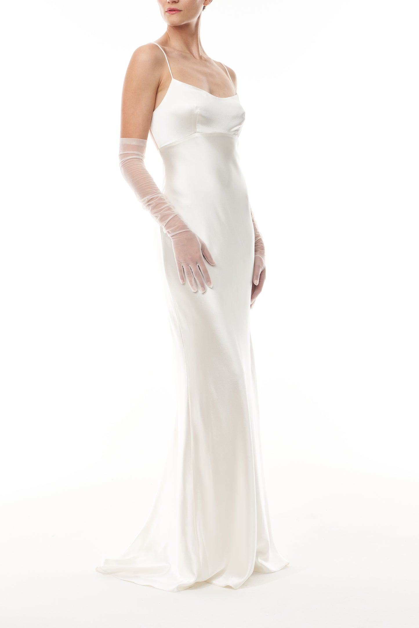 Opera length gloves in silk white tulle shown with a satin slip gown.
