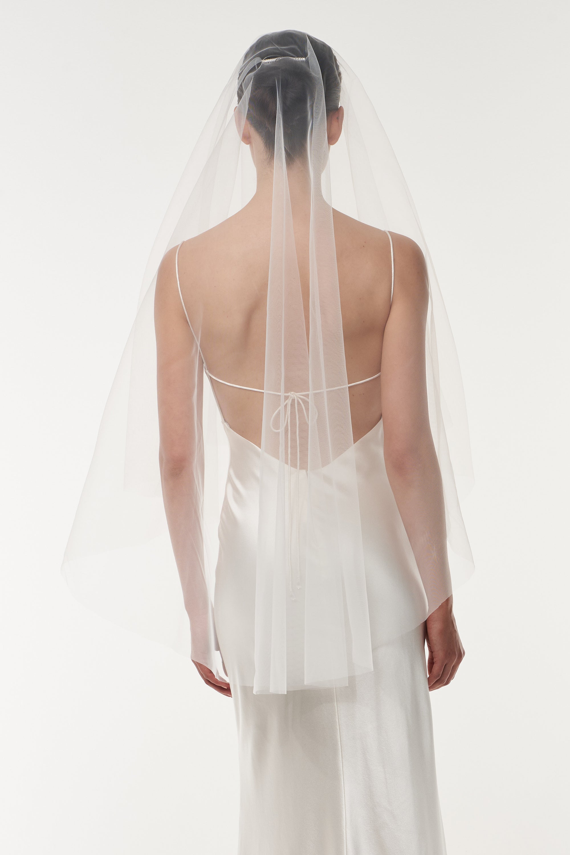 Fingertip length tulle veil with blusher