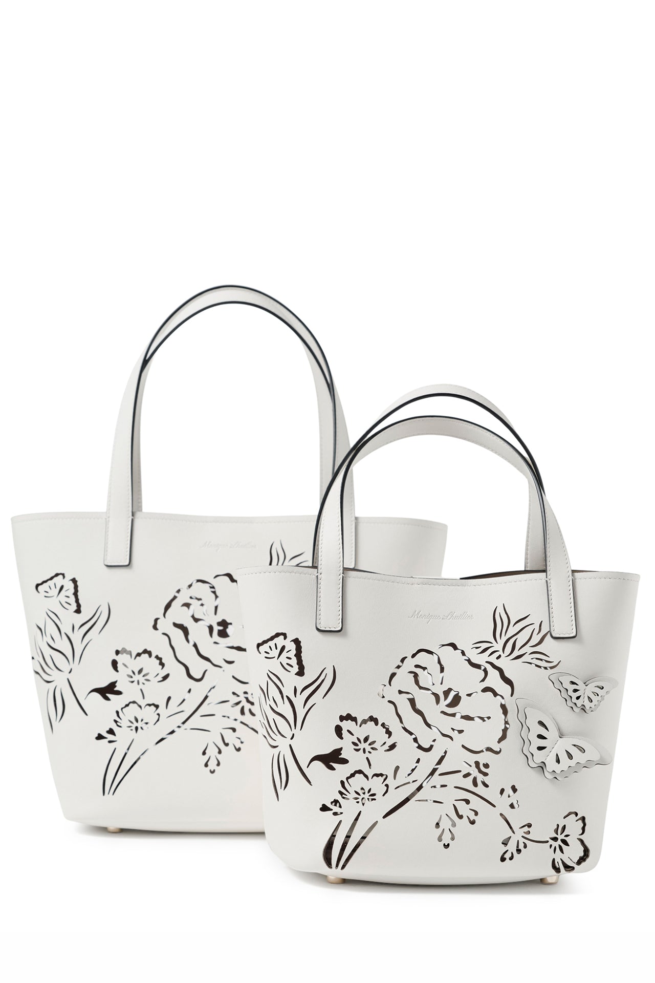 Leather top handle tote bag with laser cut florals, three-dimensional leather butterflies and small zip pouch in Ivory- front, large and small tote