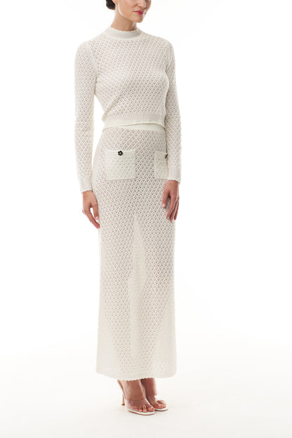 Monique Lhuillier Fall 2025 cotton diamond lace knit long sleeve top and midi skirt- side.