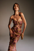 Monique Lhuillier Spring 2026 lookbook image - model wearing Plumeria/Multi Metallic Raffia Floral Embroidered strapless column gown