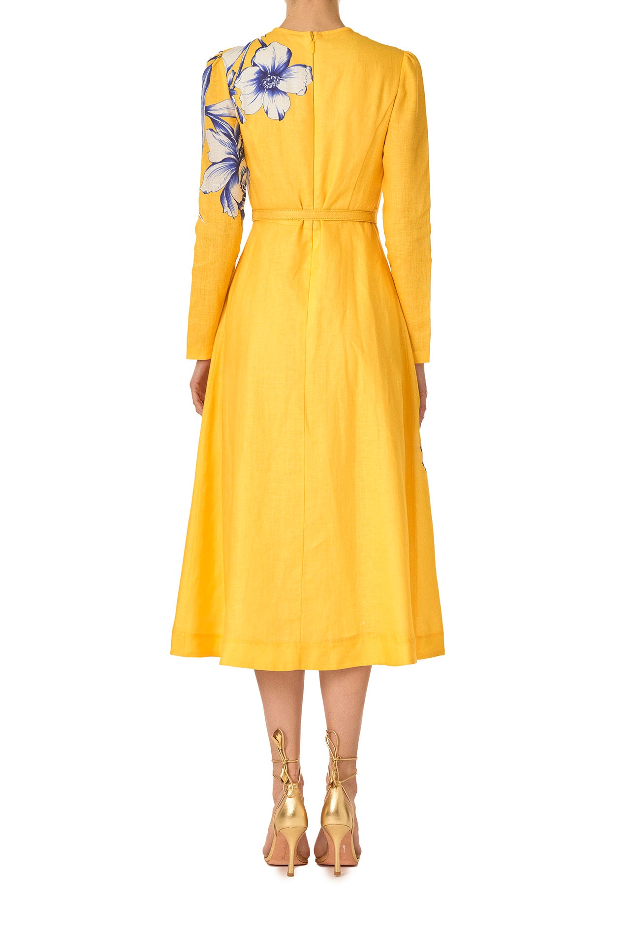 Monique Lhuillier Spring 2025 Floral printed linen long sleeve day dress with jewel neckline and circular skirt in yellow sunflower print - back.