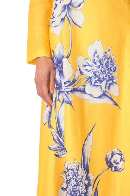 Monique Lhuillier Spring 2025 Floral printed linen long sleeve day dress with jewel neckline and circular skirt in yellow sunflower print - fabric.