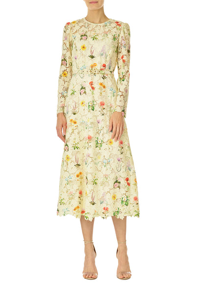 Monique Lhuillier Spring 2025 Long sleeve midi dress with jewel neckline and self-fabric belt at waist in Limoncello /Multi floral lace - front.