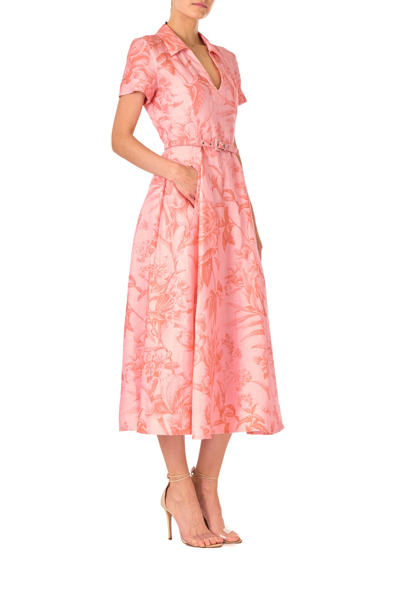 Monique Lhuillier Spring 2025 Floral printed linen dress with a-line skirt, short sleeves and pockets in Rosette Coral - right side.