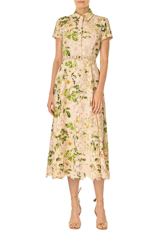 Monique Lhuillier Spring 2025 Rose printed lace shirt dress with short sleeves, button front bodice, self-fabric belt at waist and midi length skirt - front.