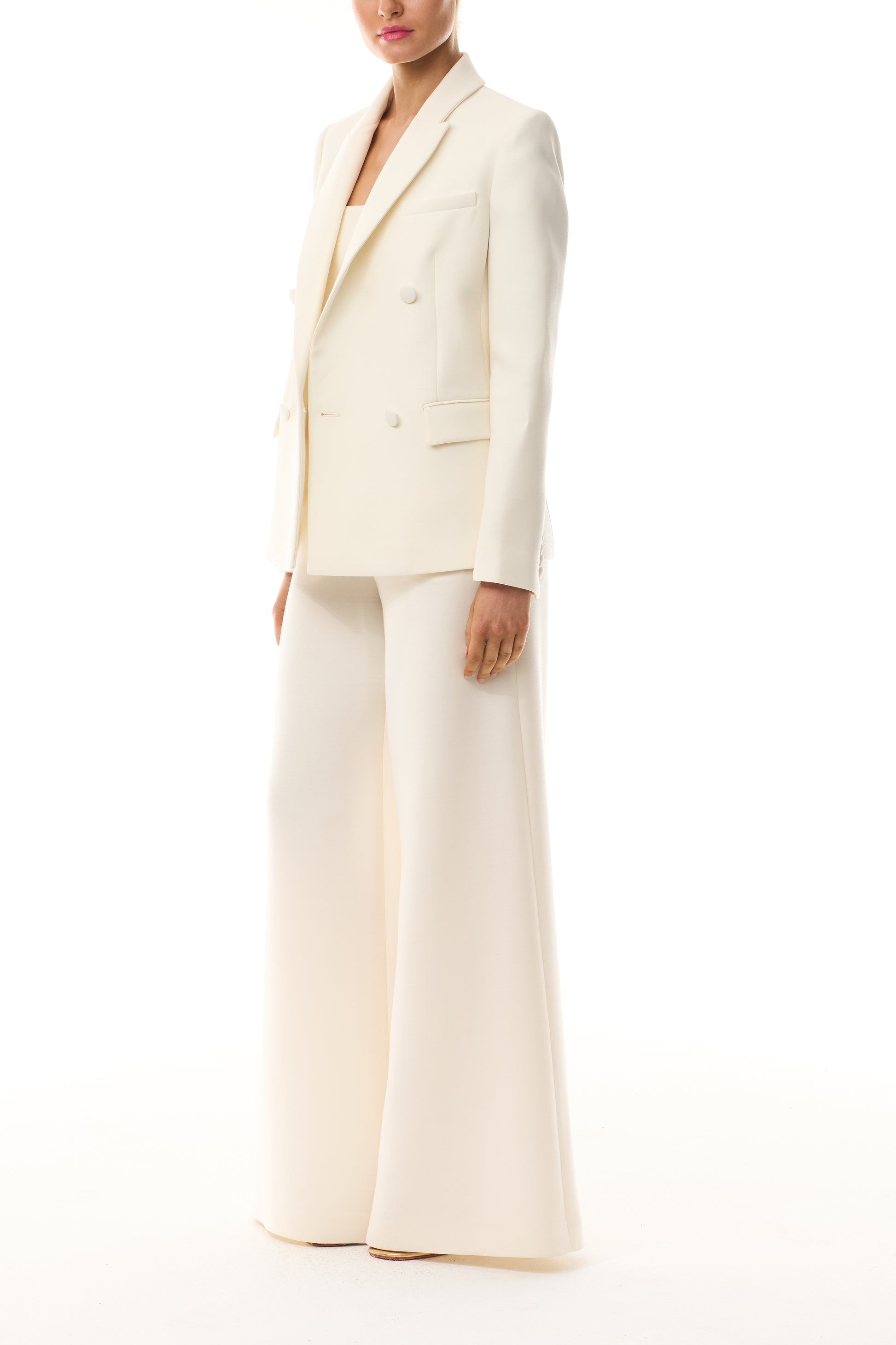 Monique Lhuillier Spring 2025 wide leg palazzo trouser in silk white wool suiting - side.