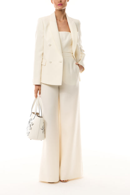 Monique Lhuillier Spring 2025 wide leg palazzo trouser in silk white wool suiting - front with blazer.