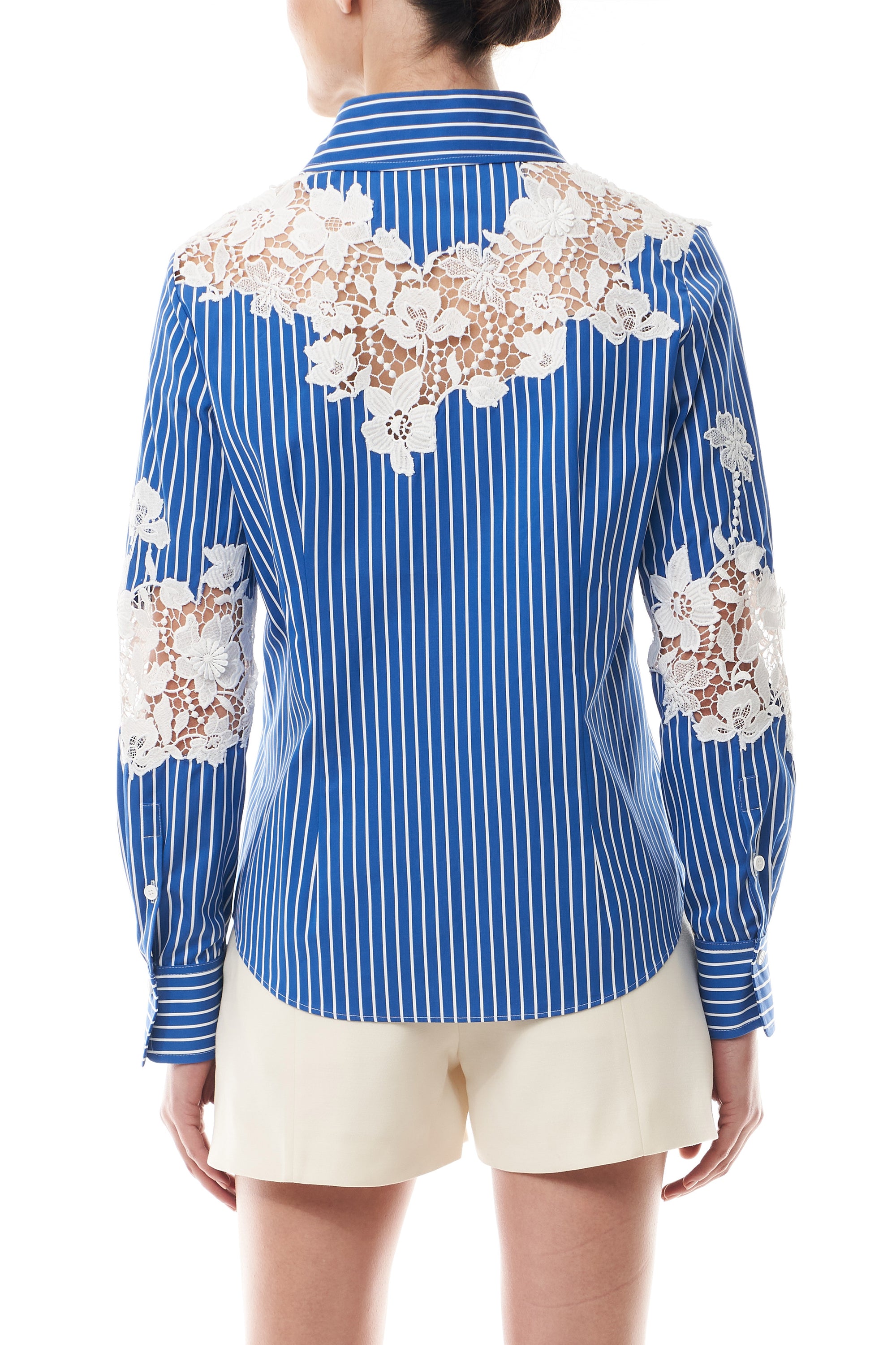 Monique Lhuillier Spring 2025 Long sleeve, button front collared striped shirt with lace detailing in Nautical Blue poplin with White lace details  - back crop.