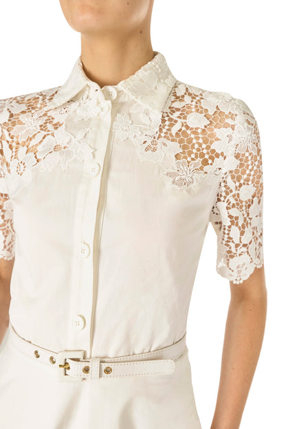 Monique Lhuillier Spring 2025 white cotton poplin dress with lace applique inserts, short sleeves, button down front bodice and belted waist - lace detail bodice.