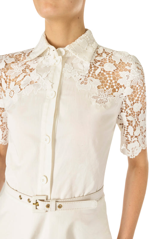 Monique Lhuillier Spring 2025 white cotton poplin dress with lace applique inserts, short sleeves, button down front bodice and belted waist - lace detail bodice.