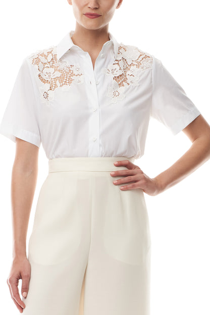 Collared, button-front short sleeve shirt in silk white poplin fabric with lace detailing at shoulders and back - front.