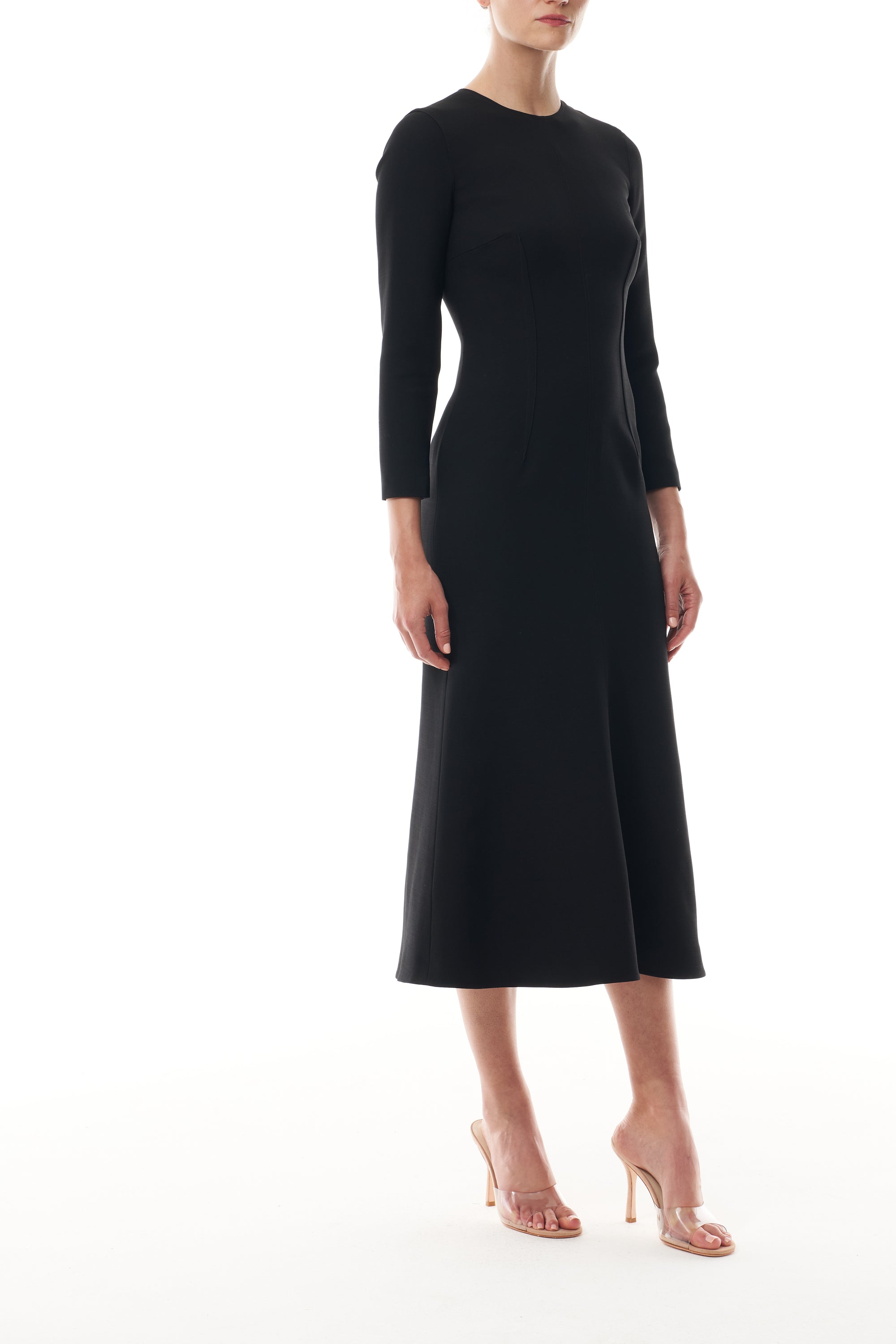 Monique Lhuillier Fall 2025 Noir Long sleeve midi dress in lightweight silk wool suiting - side.