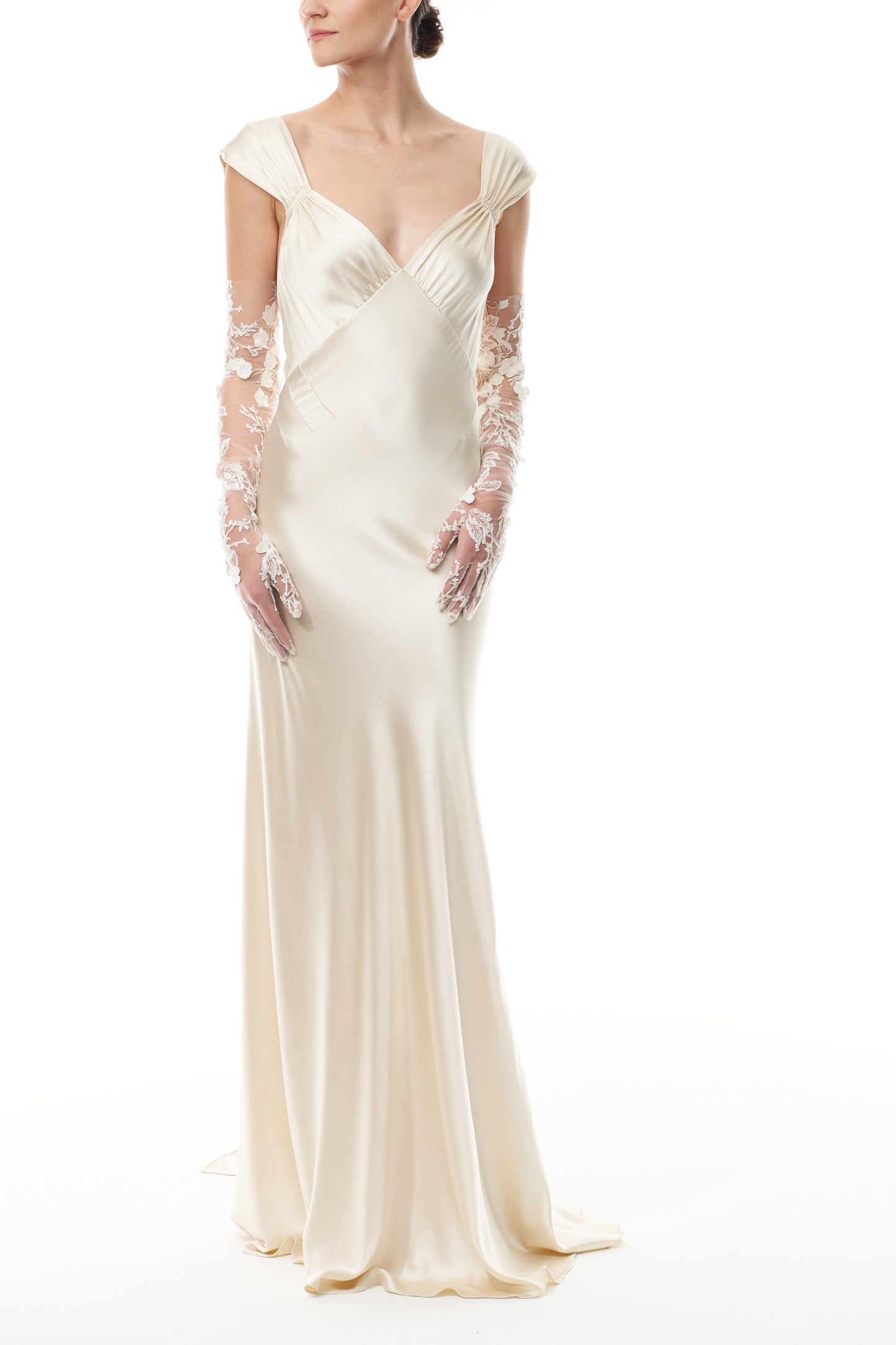 Opera length tulle gloves in metallic ivory floral embroidery.  Shown with an ivory satin gown.