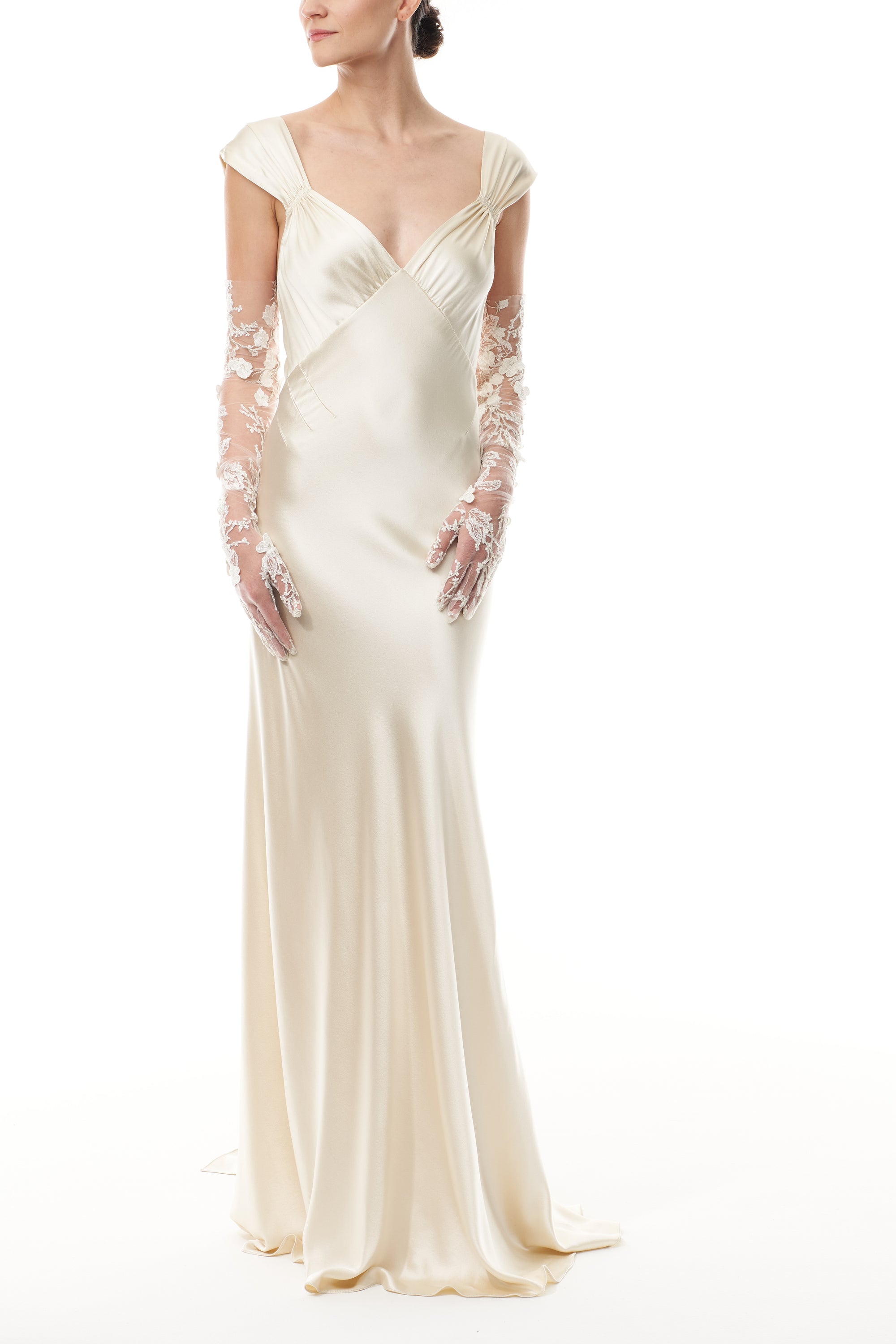 Opera length tulle gloves in metallic ivory floral embroidery.  Shown with an ivory satin gown.