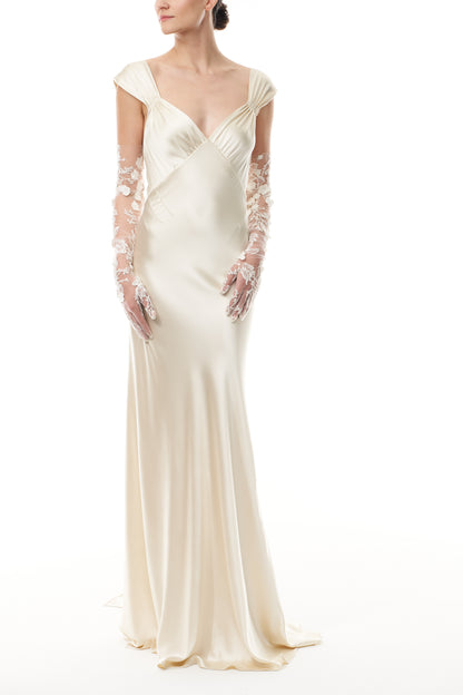 Opera length tulle gloves in metallic ivory floral embroidery.  Shown with an ivory satin gown.