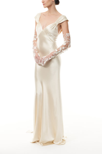 Opera length tulle gloves in metallic ivory floral embroidery.  Shown with an ivory satin gown.