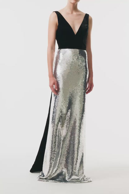 Monique Lhuillier Fall 2025 deep v-neck gown with train in noir velvet and silver sequins - video.