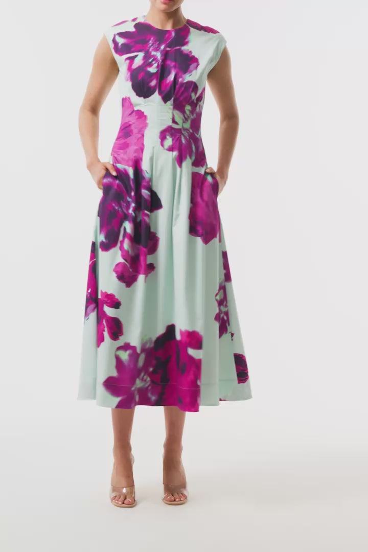 Monique Lhuillier Fall 2025 Lagoon Multi Electric Floral Printed Poplin sleeveless pleated day dress- video.