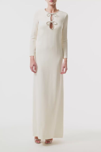 Monique Lhuillier Fall 2025 Ivory Crystal bow key-hole mini dress in lightweight silk wool suiting -  video.