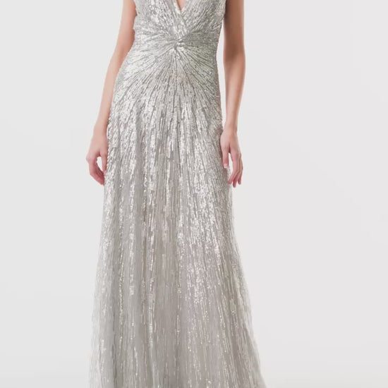 Monique Lhuillier Fall 2025 V-neck gown in silver embroidered tulle - video.