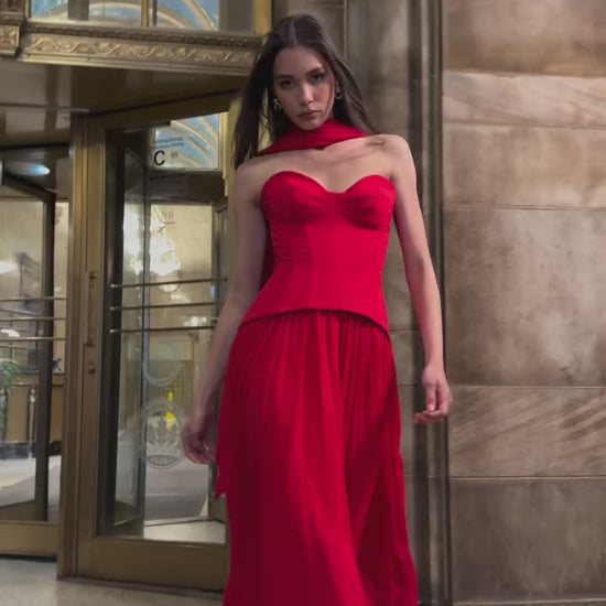 Monique Lhuillier Fall 2025 Vermilion crepe and chiffon Dropped waist corset
gown- look book video footage