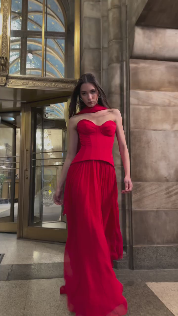 Monique Lhuillier Fall 2025 Vermilion crepe and chiffon Dropped waist corset
gown- look book video footage