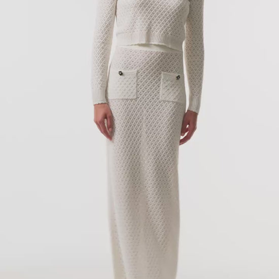 Monique Lhuillier Fall 2025 cotton diamond lace knit long sleeve top and midi skirt- video.