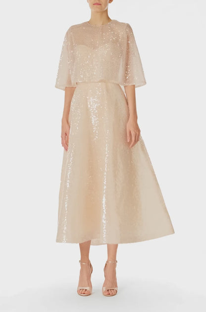 Monique Lhuillier Spring 2025 prosecco colored sequin capelet - video.