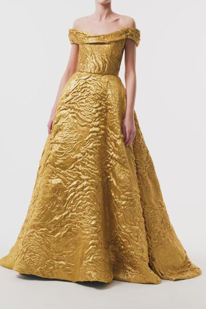 Monique Lhuillier Fall 2025  Gold Lame Rose Jacquard off-the-shoulder ball gown  - video.