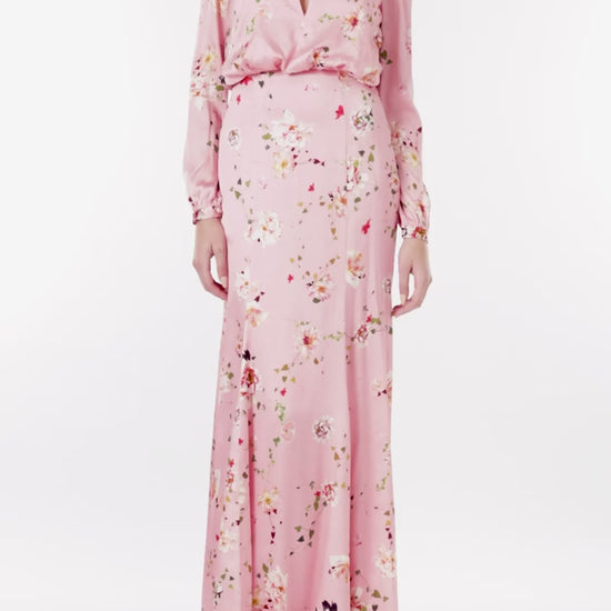 Monique Lhuillier peony floral long sleeve gown with keyhole bodice and draped back.
